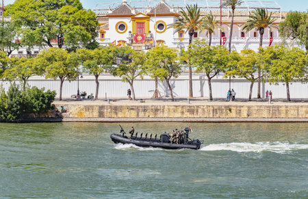 Seville, Spain - May 31, 2019: Army boat over the Guadalquivir river during display of Spanish Armed Forces Day in Seville, Spainのeditorial素材