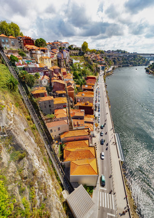 View of Funicular dos Guindais and picturesque houses in historic center of Porto city (Oporto) Portugal.のeditorial素材