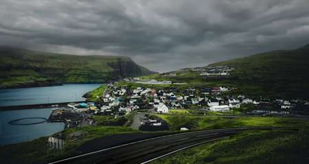 Beautiful town in the Faroe Islands, sit on the north coast of Streymoy, Stunning Scandinavian Village, Located On The Faroe Islands, Denmarkの写真素材