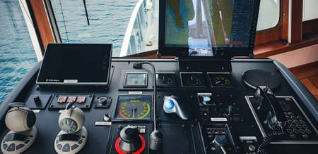 Klaksvik, Faroe Islands - July 19, 2019: Control panel and navigation of a Farming service vessel dedicated to the transport of salmonのeditorial素材