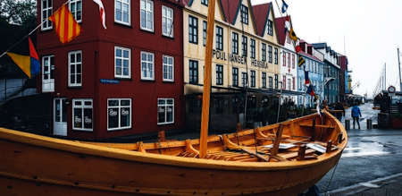 Torshawn, Faroe Islands - July 20, 2019: Colorful buildings and boats in Vestaravag harbor. Torshawn city is the capital and largest city of the Faroe Islands. Danish.のeditorial素材