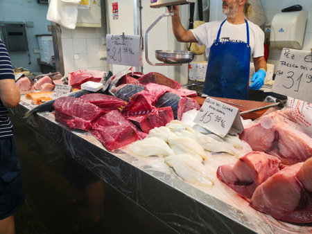 Cadiz, Spain - August 03, 2023: Cadiz Fish Market. Stunning Fresh fish stall in The Central Market of CÃ¡diz, Andalusia, Spain. It is the oldest covered market in Spain and where the Atlantic Ocean offers the freshest fish and seafood in Spain with piles のeditorial素材