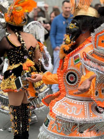 Seville, Spain, March 07 2026, Bolivian and Ibero-American Carnival. The Latin community shows off its traditional regional costumes and dances to the rhythm of the music.のeditorial素材