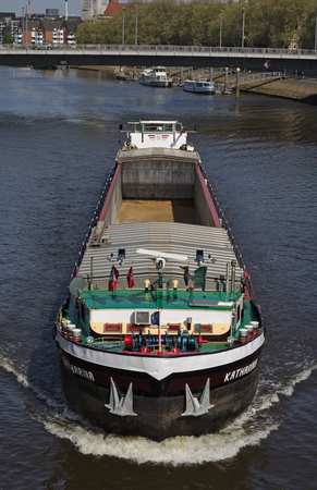 Bremen, Germany - April 27th, 2018 - Front view of an inland vessel on the river Weser heading directly towards the viewerのeditorial素材