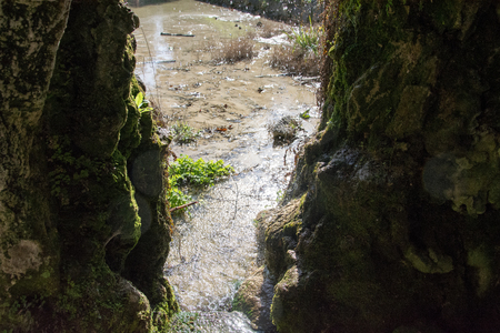 small river from waterfall are a natural  beauty in a Roman green parkの写真素材