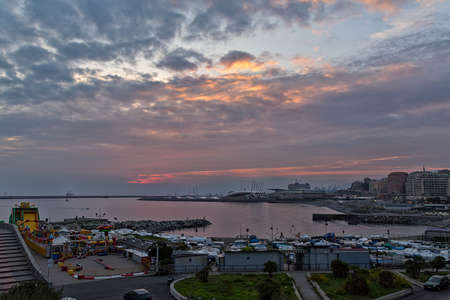 an explosion of colors under the cloudy day, the golden hour in Genoa, central coastの写真素材
