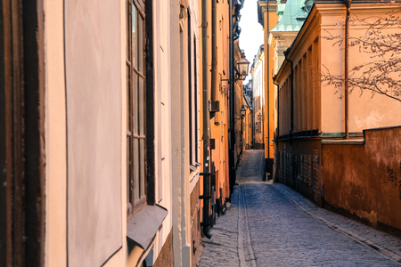 The picture from the narrow traditional streets of Stockholm. Walking inside the Gamla Stan.の写真素材