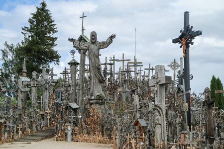 The picture from the hill of crosses by Å iauliai in Lithuania. Many crosses on this religious places and many of them old and abandoned.の写真素材
