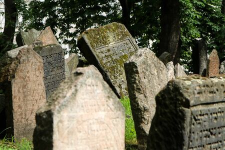 The very old jewish cemetery with a lot of shabby stone tombstones.の写真素材