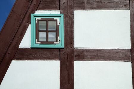 A picture of the historical brick family house in Klaipeda in Lithuania. The detail of the...