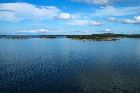 The Picture from a ferry between Sweden and Finland. The small Swedish islands are visible from the boat.の写真素材