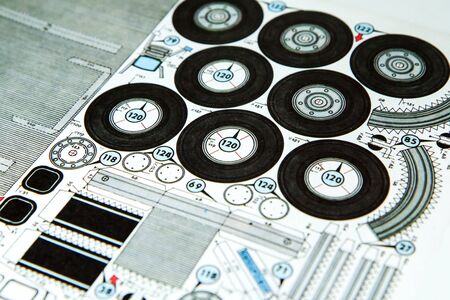A detail of an old paper cutout of a truck.