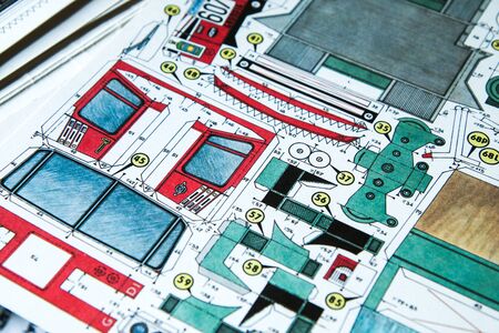 A detail of an old paper cutout of a truck.