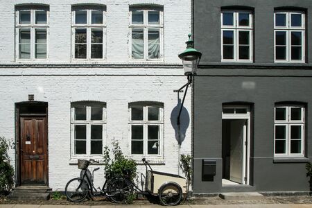 The typical danish terraced houses with their colorful facades. Nice example of scandinavian design.