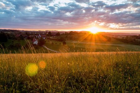 A nice scenic evening view over the rural european countryside with beautiful sundown.