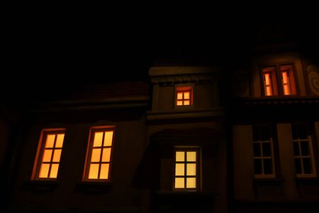 A picture of an old streetÂ´s model with only the lights and windows visible.の写真素材