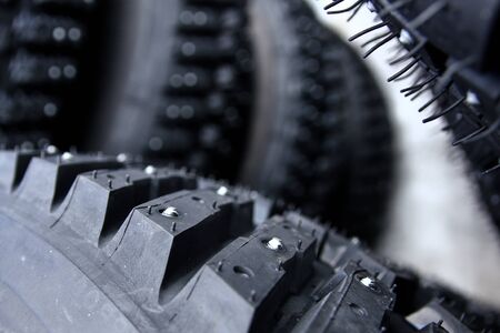 A detail of the tyre with studs used for the rally cars to have a better control on snow and ice.