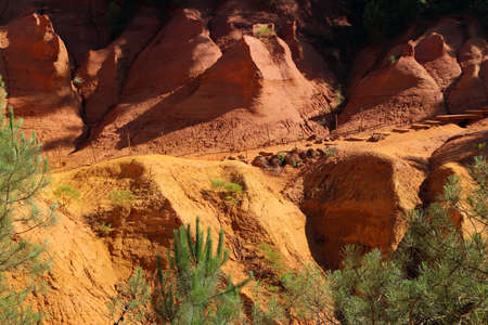 The nice yellow and red sandstone rocks by Roussillon in France. The nice natural sight and tourist...