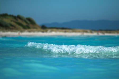 The detail of the sea wave in Rosignano in Italy. Famous white beach looks exotic and tropical.