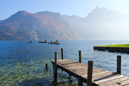 Morning by the lake. The boats are heading to a lake.