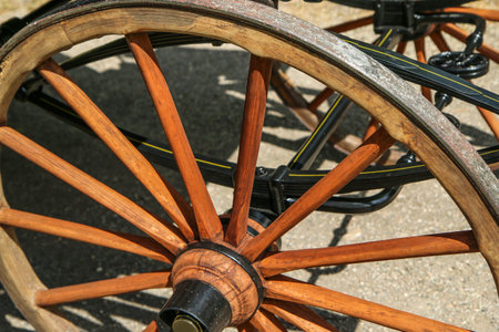 The detail of the wooden wheel of the old coach.の写真素材