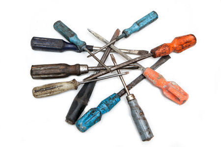 The set of aged and worn screwdrivers isolated in a white background. Old, but still useful.の写真素材