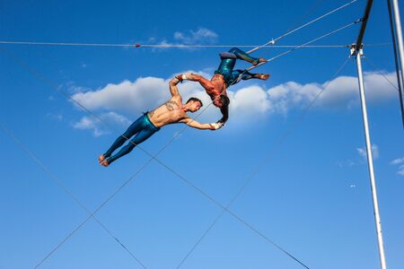 Montreal, Quebec, Canada- 07-09-2012: Trapezists show in the old port of Montrealのeditorial素材