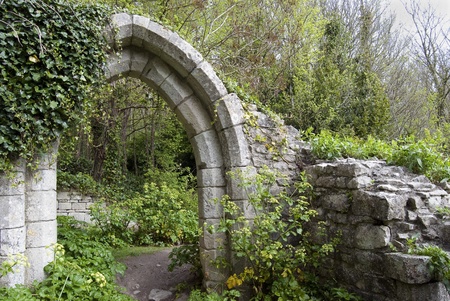 ancient English arch in a parkの写真素材
