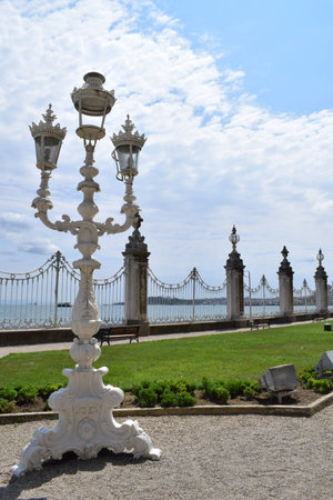 Antique white streetlight with beautiful designの写真素材