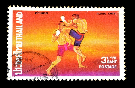 THAILAND - CIRCA 1984 A stamp printed in Thailand shows thai boxing style, circa 1984の写真素材