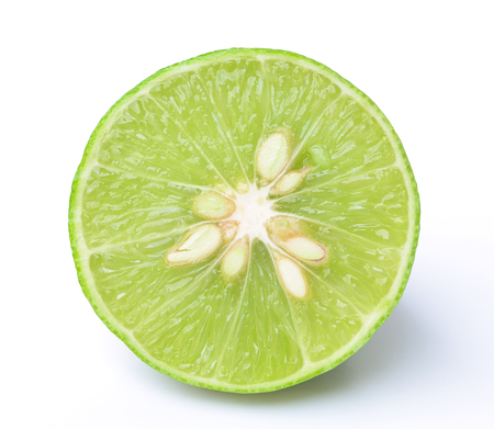 Lime - Slice of lime photographed from above and isolated on white background  Studio shot の写真素材