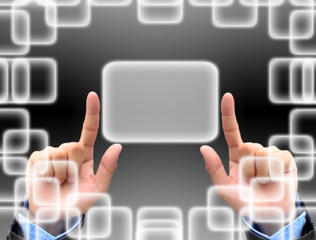 hand pushing a button on a touch screen interfaceの写真素材