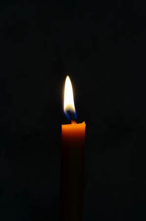 candle isolated on black background.の写真素材