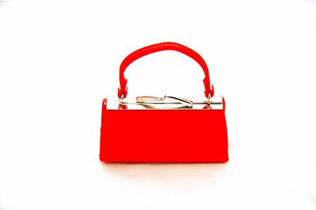 red coin purse on whiteの写真素材