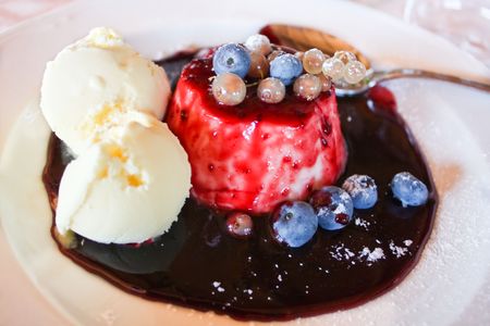 Food Series - Desserts. Plate with panna cotta and ice cream.の写真素材