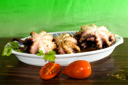 Food and Drinks - Italian recipes - Plate with octopus cooked in italian style.の写真素材