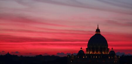 Night Photography. Silhouette shot of St. Peter's Dome in Rome.の写真素材