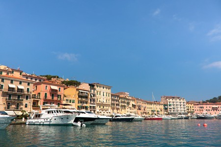 Boats and buildings in Portoferraio, Elba Island, Italy.の写真素材