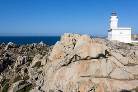 White lighthouse at Capo Testa, Sardinia, Italy.の写真素材