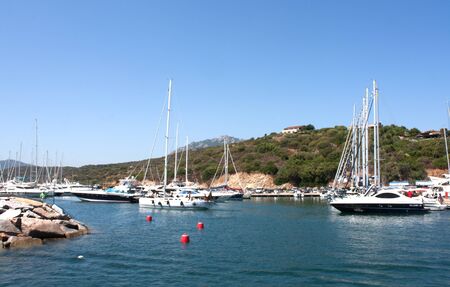 Portisco, Sardinia, Italy, August 1, 2009 - Boats in the tranquil port of Portisco.のeditorial素材