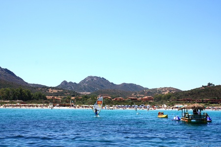 Golfo Di Marinella, Sardinia, Italy, August 5, 2009 - Crowded beach viewed from the sea.のeditorial素材
