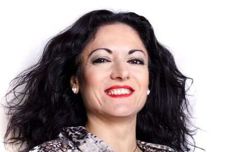 Portrait of young caucasian woman smiling, on white background.