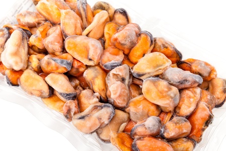Food Preservation - Package of frozen mussels on white background の写真素材
