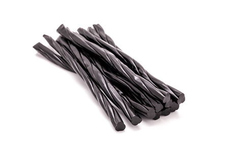 Licorice sticks on white background の写真素材