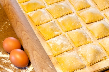 Fresh handmade agnolotti, typical Italian egg pasta from Piedmont, Langhe and Monferrato.の写真素材