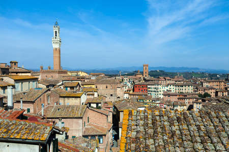 Siena, Tuscany, Italy - Aerial view on Mangia Tower and Siena roofs.の写真素材