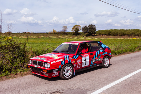 SUTRI, LAZIO, ITALY - APRIL 6, 2014: Red Lancia Delta Martini Racing with the occasion of the 11-th meeting of spring memorial Luciano Polverari. のeditorial素材