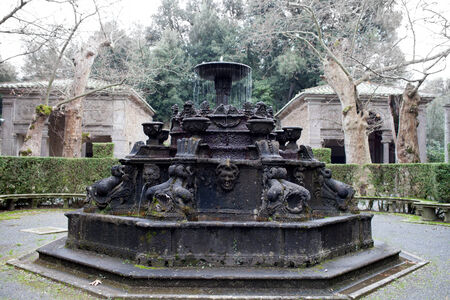 The Fountain of Dolphins inside the gardens of Villa Lante at Bagnaia, Viterbo province, Italy.の写真素材