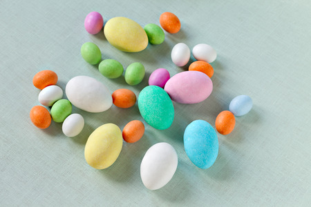Colorful Easter eggs made with sugar and chocolate.