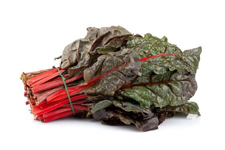 Bunch of fresh cut red chard isolated on white background.の写真素材
